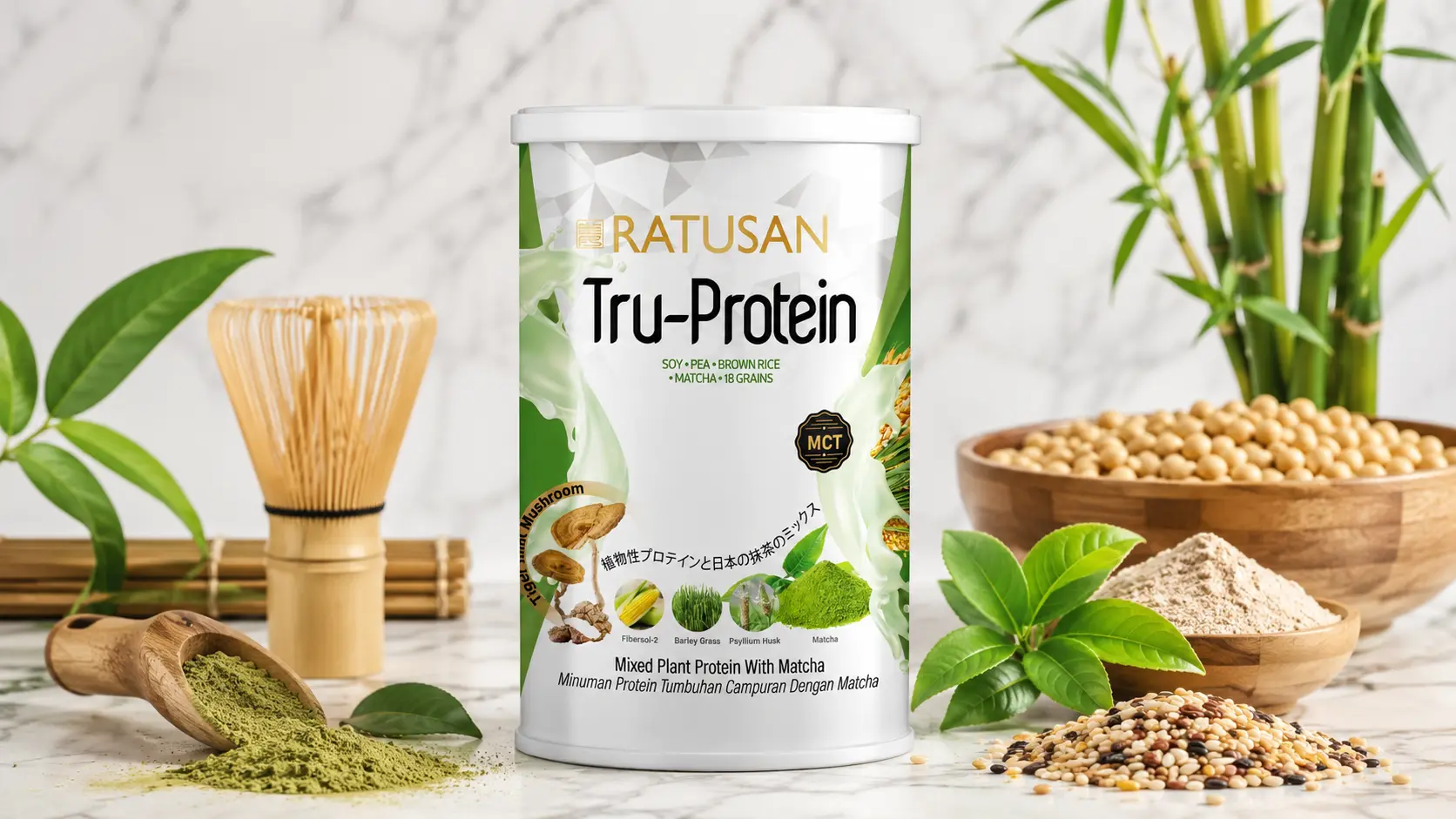 Ratusan Tru-Protein tin on a clean marble surface with matcha powder, mixed grains and fresh green matcha leaves